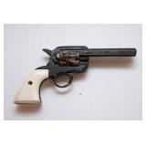 Assorted Collectibles – Belt Buckle, Wooden Toy Gun, Mini Engine