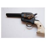 Assorted Collectibles – Belt Buckle, Wooden Toy Gun, Mini Engine