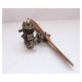 Assorted Collectibles – Belt Buckle, Wooden Toy Gun, Mini Engine