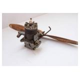 Assorted Collectibles – Belt Buckle, Wooden Toy Gun, Mini Engine