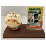 Brooks Robinson Autographed Baseball With 1975 Topps Baseball Card On Stand