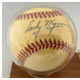 Early Wynn Autographed Baseball With 1959 Topps Baseball Card On Stand
