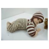 Vintage Porcelain Baby 12" long by 6.5"tall