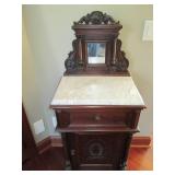 Ornate makeup stand with a marble t...