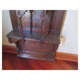 Ornately framed wall mirror with ma...