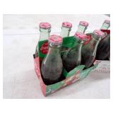 12 Vintage Coke Bottles with Christmas Cases