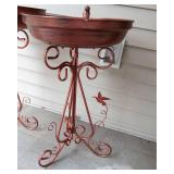 Two Copper-Colored Bird Baths & Three Colorful Metal Wall Hangings