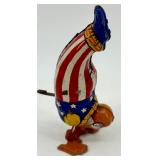Vintage J. Chein Clown Wind-Up Tin Toy, Plastic Hen with Eggs, and Red Metal Wagon