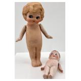 Pair of Antique Bisque Jointed Dolls including Kewpie