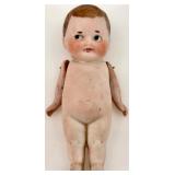 Pair of Antique Bisque Jointed Dolls including Kewpie