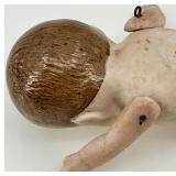 Pair of Antique Bisque Jointed Dolls including Kewpie