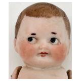 Pair of Antique Bisque Jointed Dolls including Kewpie