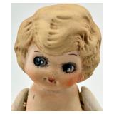 Pair of Antique Bisque Jointed Dolls including Kewpie