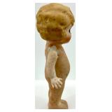 Pair of Antique Bisque Jointed Dolls including Kewpie