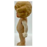 Pair of Antique Bisque Jointed Dolls including Kewpie