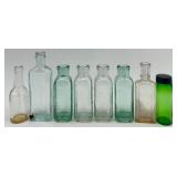 Collection of 8 Vintage Glass Bottles and Jars Mixed Shapes and Colors