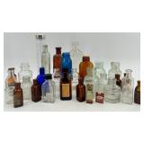 Collection of 25 Vintage Glass Bottles in Assorted Styles and Colors
