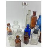 Collection of 25 Vintage Glass Bottles in Assorted Styles and Colors