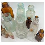 Collection of 25 Vintage Glass Bottles in Assorted Styles and Colors