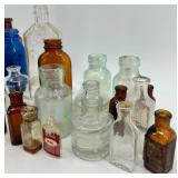Collection of 25 Vintage Glass Bottles in Assorted Styles and Colors
