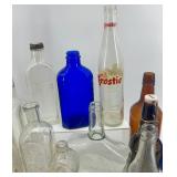 Collection of 18 Vintage and Antique Glass Bottles Assorted Colors and Shapes