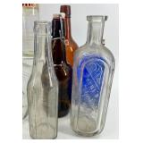 Collection of 18 Vintage and Antique Glass Bottles Assorted Colors and Shapes