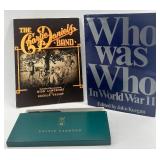 Book Lot: Who Was Who in World War II, Charlie Daniels Band Songbook, and Prince Gardner Wallet