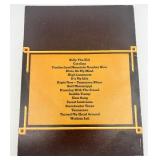 Book Lot: Who Was Who in World War II, Charlie Daniels Band Songbook, and Prince Gardner Wallet