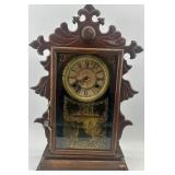 Pair of Antique Wooden Mantel Clocks with Ornate Details