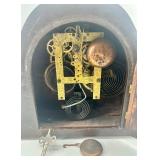 Pair of Antique Wooden Mantel Clocks with Ornate Details