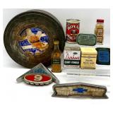 Collection of Vintage Metal Tins, Kitchen Spice Bottles, Car Emblems, and Kodak Film Reel