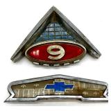 Collection of Vintage Metal Tins, Kitchen Spice Bottles, Car Emblems, and Kodak Film Reel