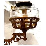 Antique Wall-Mounted Kerosene Oil Lamp with Reflector and Ornate Cast Iron Bracket