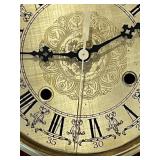 Antique Wood Case Wall Clock with Brass Pendulum and Roman Numeral Dial