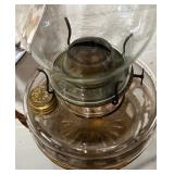 Antique Wall-Mounted Kerosene Oil Lamp with Reflector and Ornate Cast Iron Bracket