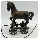 Vintage Mixed Lot: Cast Iron Trivet, Horse Pull Toy, Spice Tins, Glass Insulators, and Collectible Containers