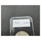 1887 Morgan Silver Dollar Marked UNC When Purchased