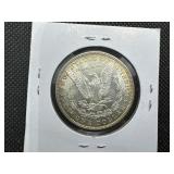 1885 Morgan Silver Dollar Marked AU When Purchased
