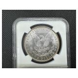 1887 Morgan Silver Dollar NGC MS62 - Rainbow Orange and Blue Toned!!