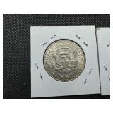 Two 90% Silver Kennedy Half Dollars - 1964 and 1964-D Both Marked AU 55 When Purchased
