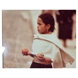 Framed Photograph of a Girl Holding a Tomato and Onion by Minnesota Native Photojournailst Paul Chesley - Approx. 20 1/2" x 26 1/2"