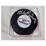 Autographed Mike Modano USA Hockey Puck in Display Case with Certificate of Authenticity