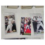 Huge lot of 1994 Fleer Extra Bases Featuring Barry Bonds, Mark McGwire, Ken Griffey Jr., Greg Maddux and Many More