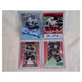 Lot of 4 Blake Lizotte Hockey Cards featuring Rookie, Auto, and Holo. Contains cards from sets including Ice Premieres 9/399 and Credentials 1/65