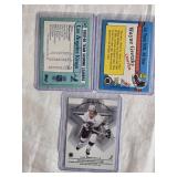 Lot of 3 Wayne Gretzky Hockey Cards including 1990-91 Topps All-Star and 1989-90 Team Scoring Leaders.