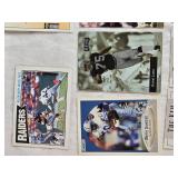Lot of 11 Football Cards Featuring Brett Favre, Steve Young, Deion Sanders, Jerry Rice, and Barry Sanders