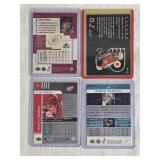 Lot of 4 Hockey Cards Featuring Mikael Renberg, Evgeni Nabokov, Sandis Ozolinsh, and Sergei Fedorov