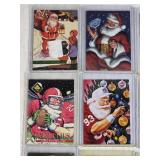 Lot of 9 Santa Claus Sports Cards Featuring Various Brands and Themes