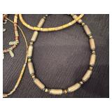 Four Gold Tone Beaded Necklaces