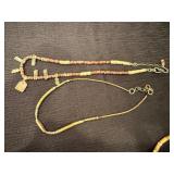 Four Gold Tone Beaded Necklaces